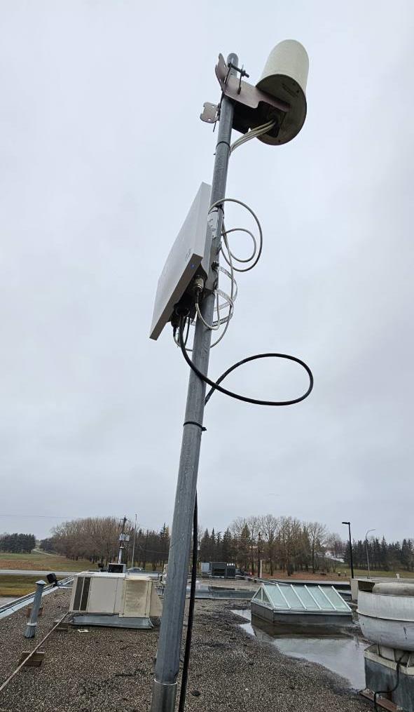 Rooftop access point replacement on a mast